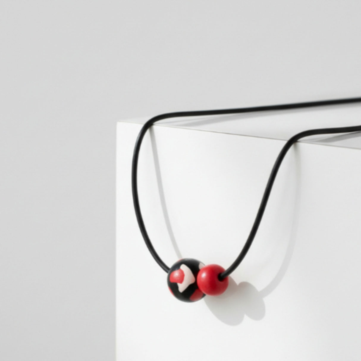 black red chunky statement necklace, lifestyle image, jewellery at lottie of london