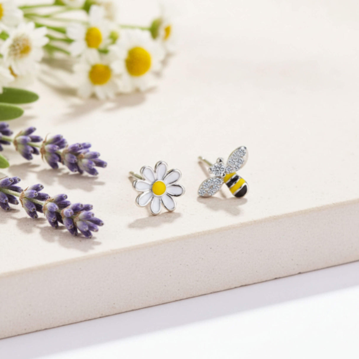 bee and daisy stud earrings, minimalist jewellery at lottie of london, lifestyle image