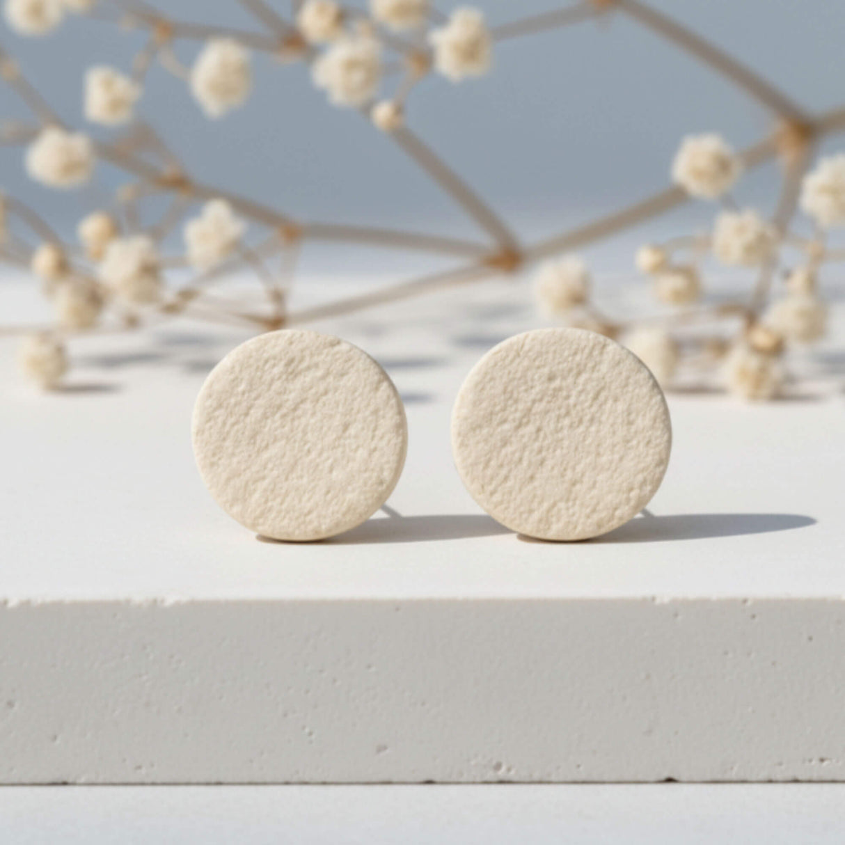 cream clay stud earrings, styled image, handmade jewellery at lottie of london
