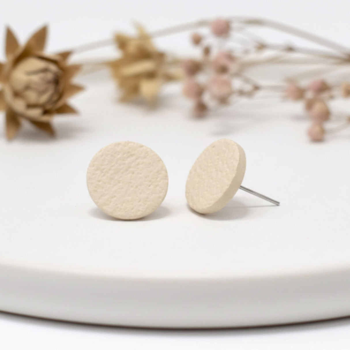 cream clay stud earrings, lifestyle image, handmade jewellery at lottie of london
