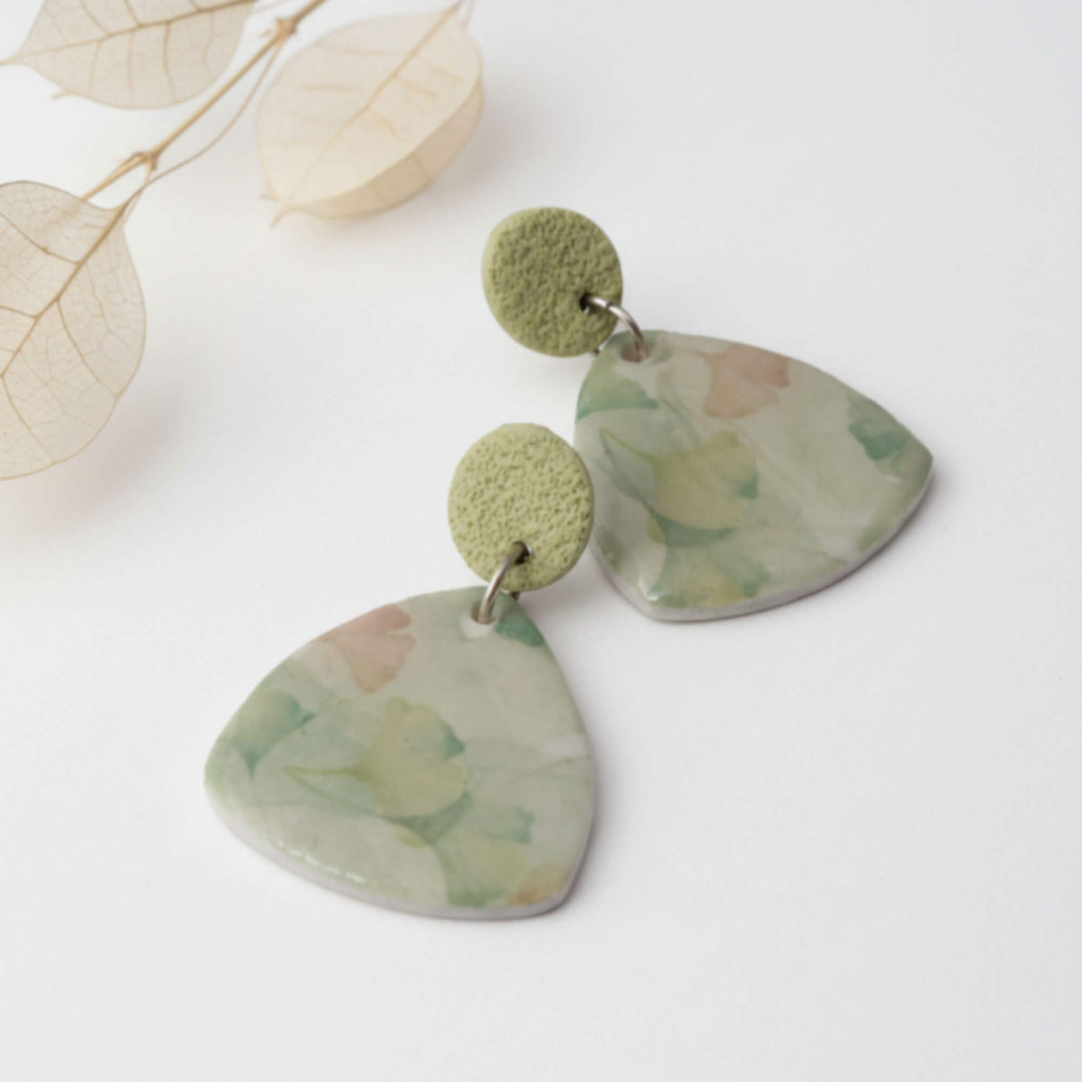 Green statement drop earrings, lifestyle image, handmade jewellery at lottie of london