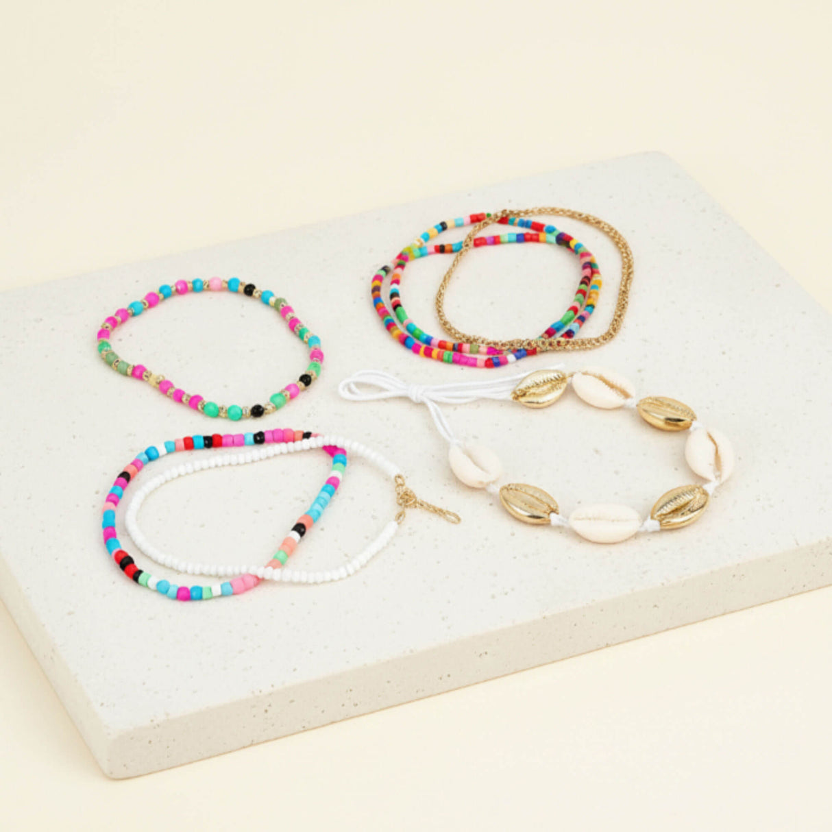 Colourful shell stacking bracelet at Lottie Of London
