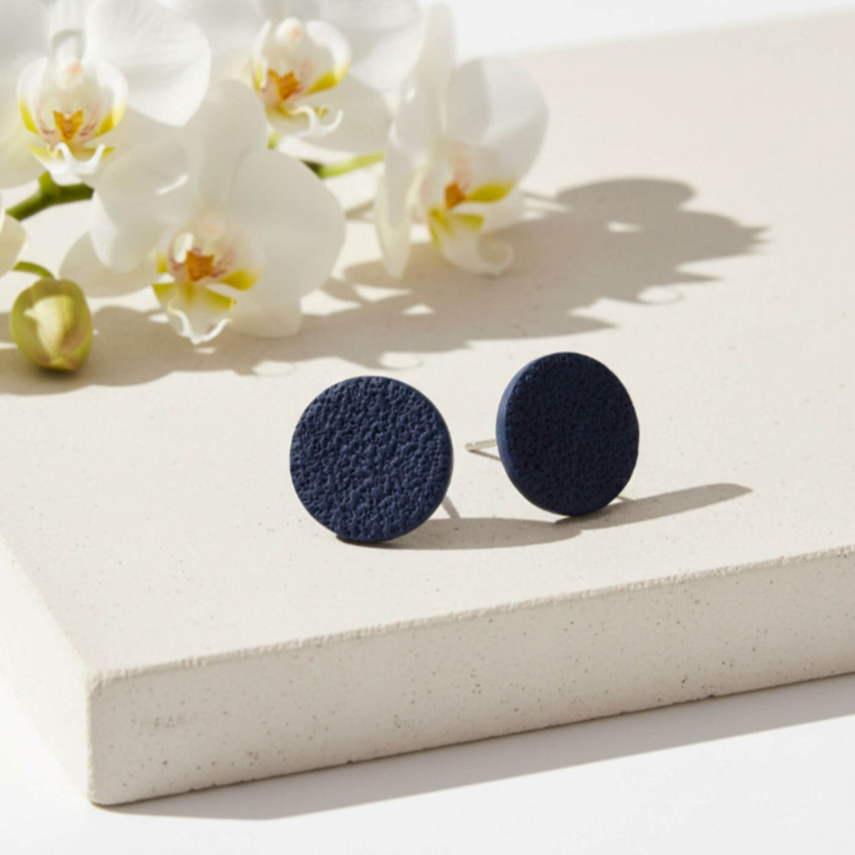 Navy blue stud earrings lifestyle handmade at Lottie Of London