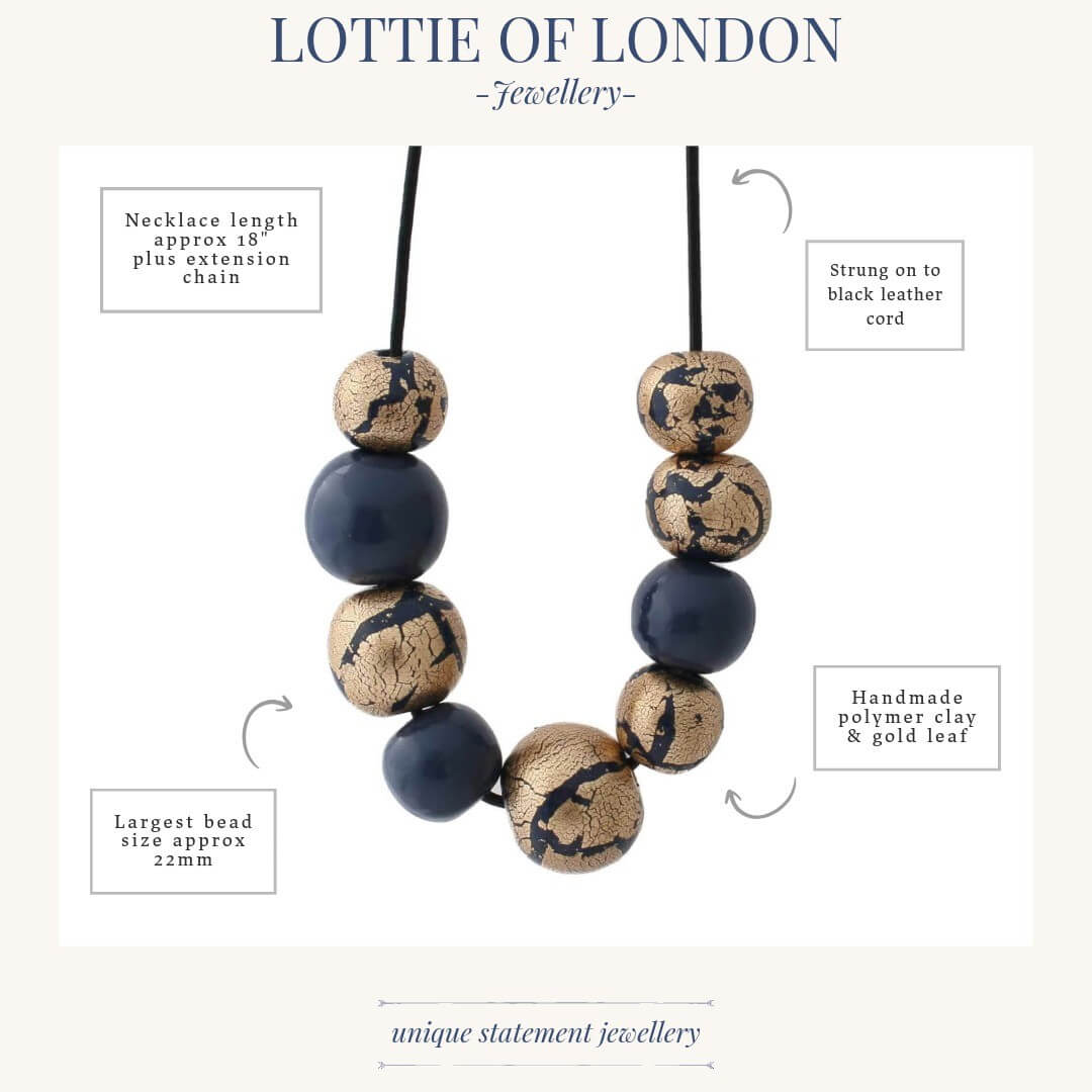 navy and gold leaf statement necklace infographics handmade at Lottie Of London