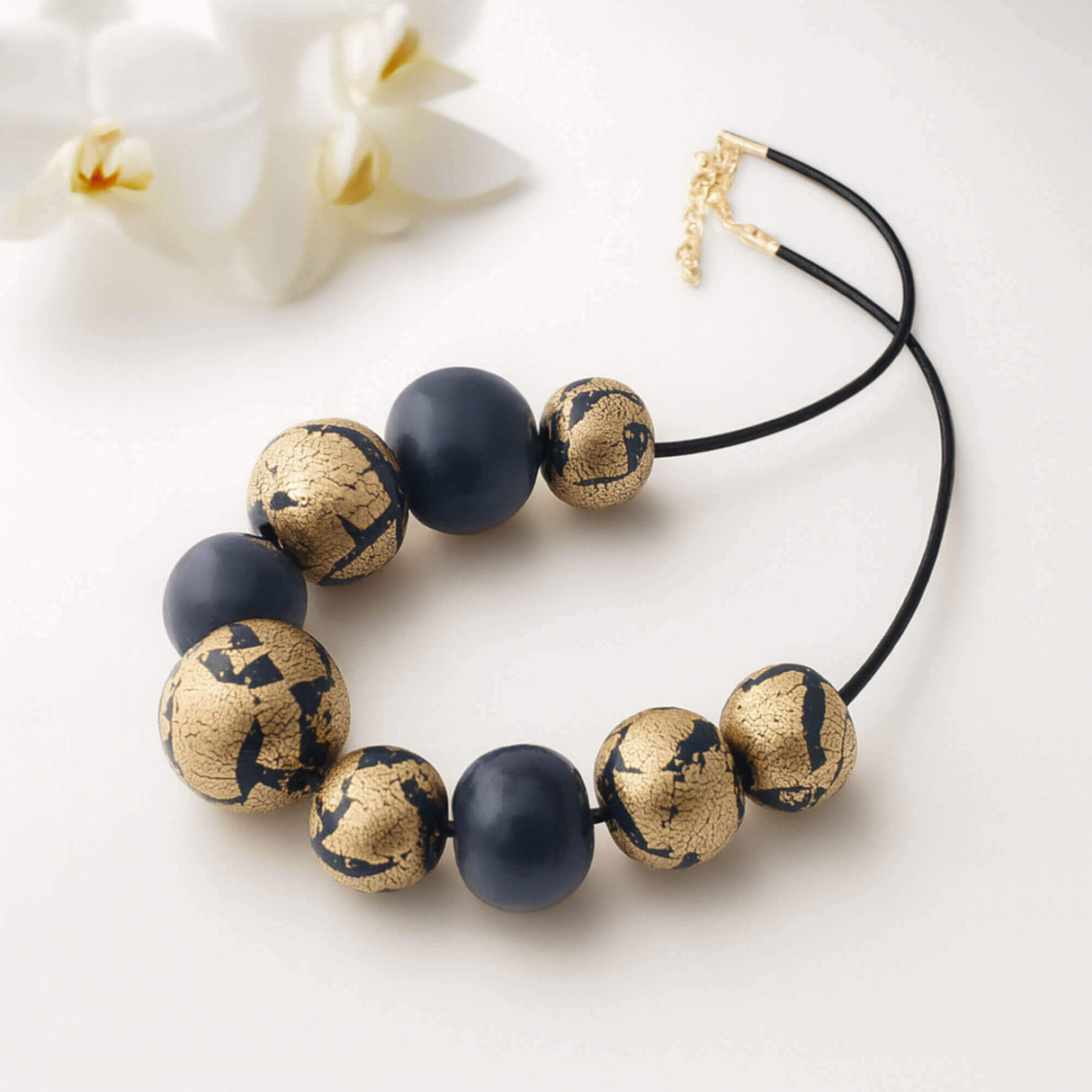 navy and gold leaf chunky statement necklace handmade at Lottie Of London