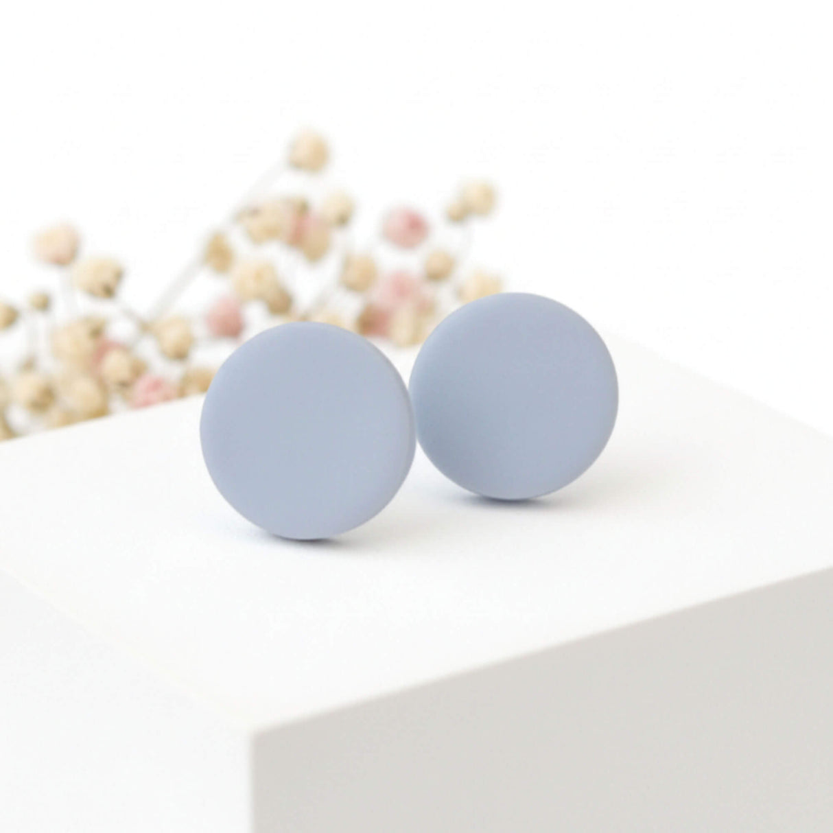 Pale Blue Clay Stud Earrings – styled image - Minimalist Handmade Jewellery - Lottie Of London Jewellery
