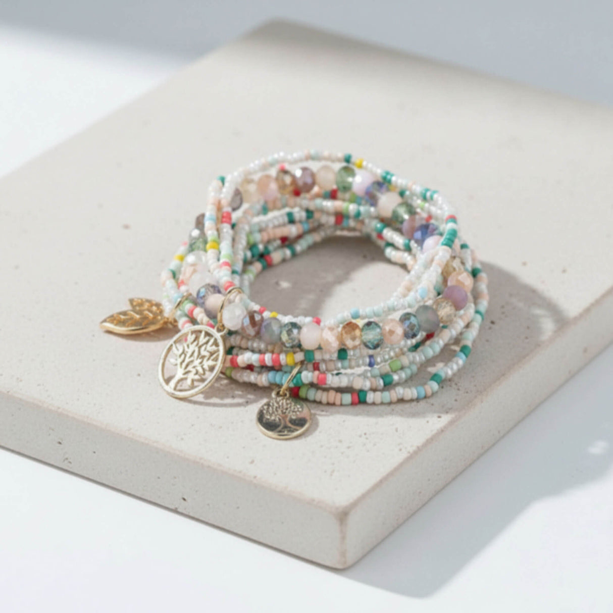 pastel and white bracelet stack at Lottie of London