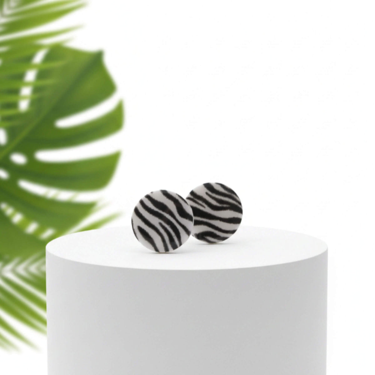 large zebra print stud earrings, handmade clay jewellery at Lottie of London, lifestyle image