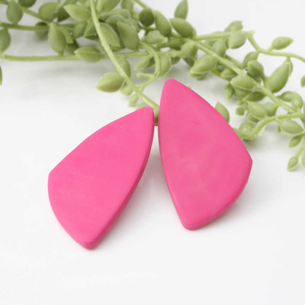 Geometric stud earrings for women in pink