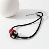 black red clay bead necklace, lifestyle image, jewellery at lottie of london