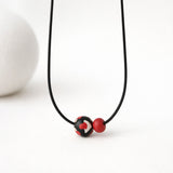 black red chunky bead necklace, lifestyle image, jewellery at lottie of london