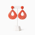 orange statement drop earrings on earrings stand - handmade jewellery at lottie of london 