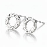 Silver circle stud earrings with hammered texture 