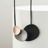 abstract pendant necklace, statement jewellery at Lotte of London, lifestyle image
