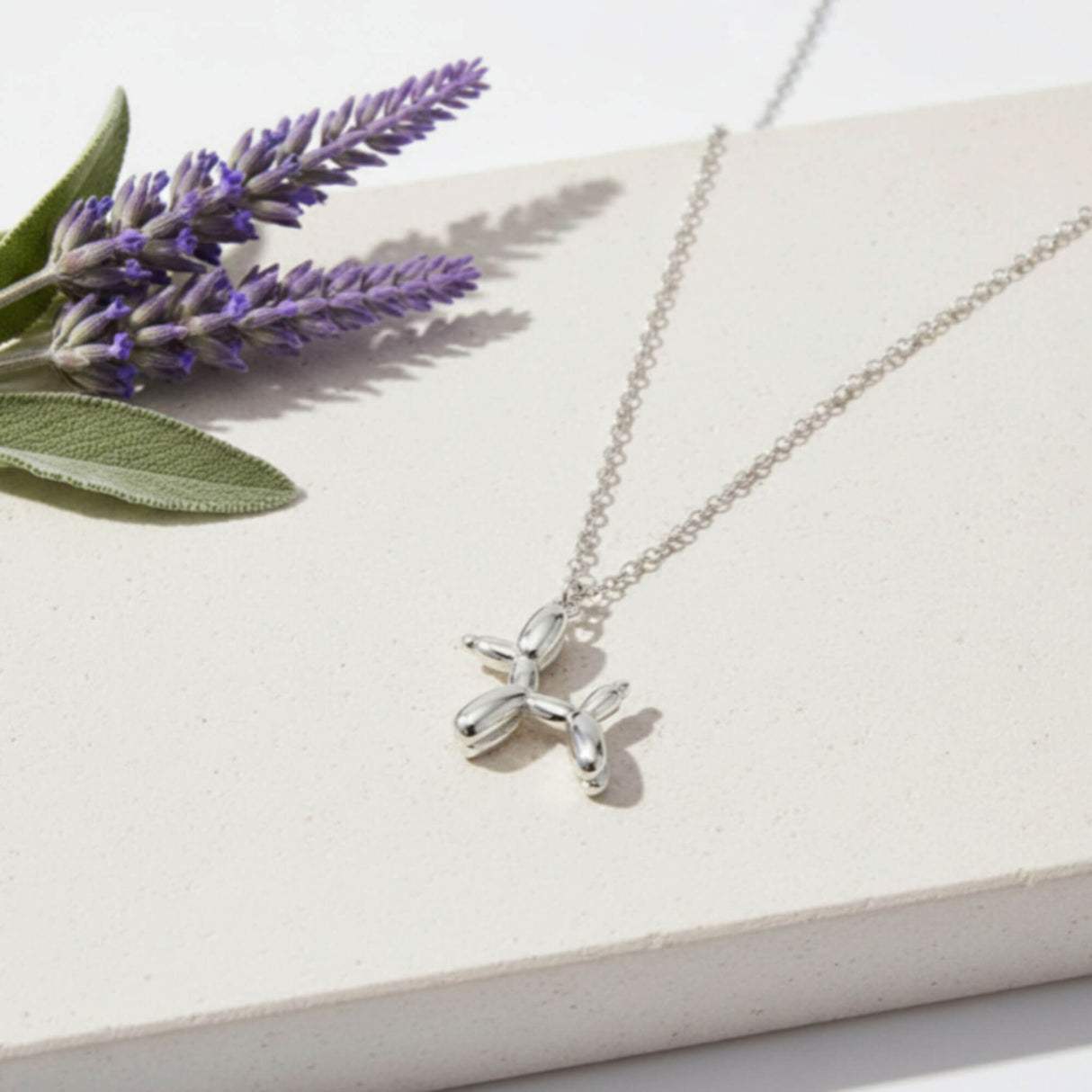Balloon dog pendant necklace,  jewellery at Lotte of London, lifestyle image