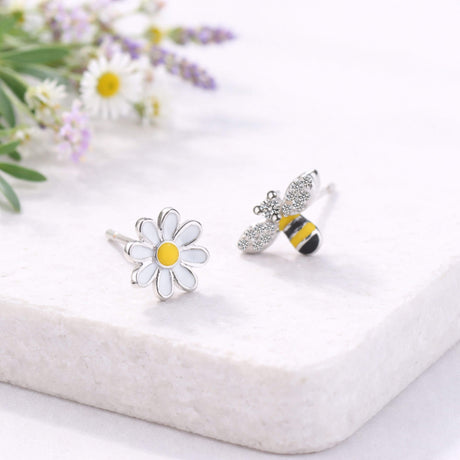 bee and flower stud earrings, minimalist jewellery at lottie of london, lifestyle image