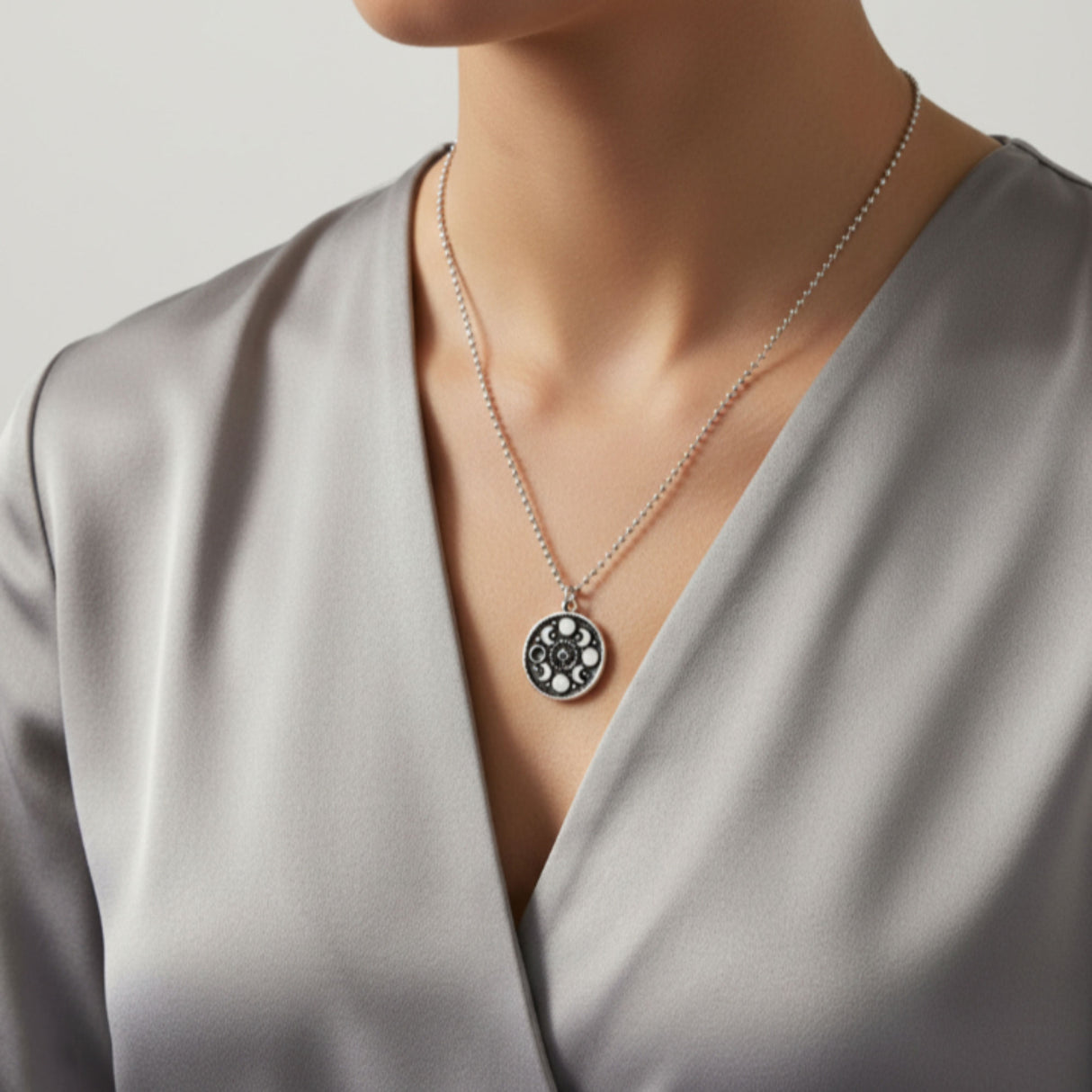 black enamel moon phase necklace model shot