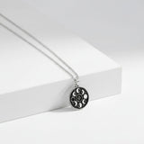 black enamel moon phase pendant