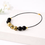 black and gold clay bead necklace handmade at Lottie of London jewellery
