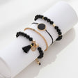 black and gold bracelet stack at Lottie of London jewellery