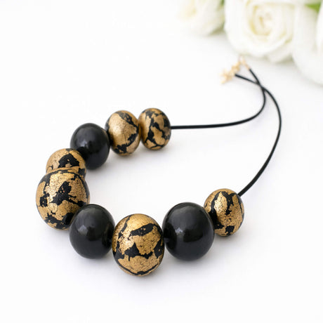 black and gold statement necklace handmade at Lottie of London