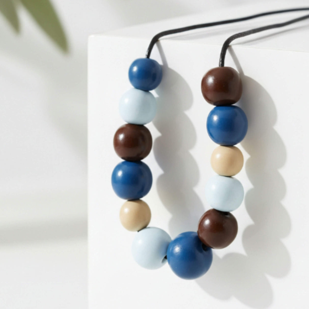 blue & brown chunky statement necklace, handmade clay jewellery at lottie of london, close up image