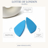 Blue geometric statement stud earrings infographics