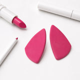 cerise pink geometric statement stud earrings flay lay image