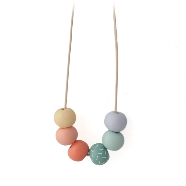 Long adjustable necklace with colorful beads on a white background