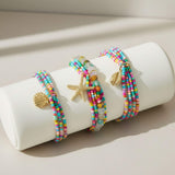 colourful bracelet stack at lottie of london