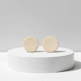 cream stud earrings on plinth, handmade clay jewellery at lottie of london 