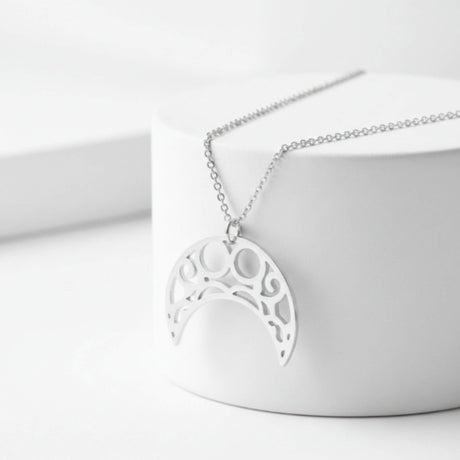 silver celestial moon pendant necklace at lottie of london jewellery, lifestyle image