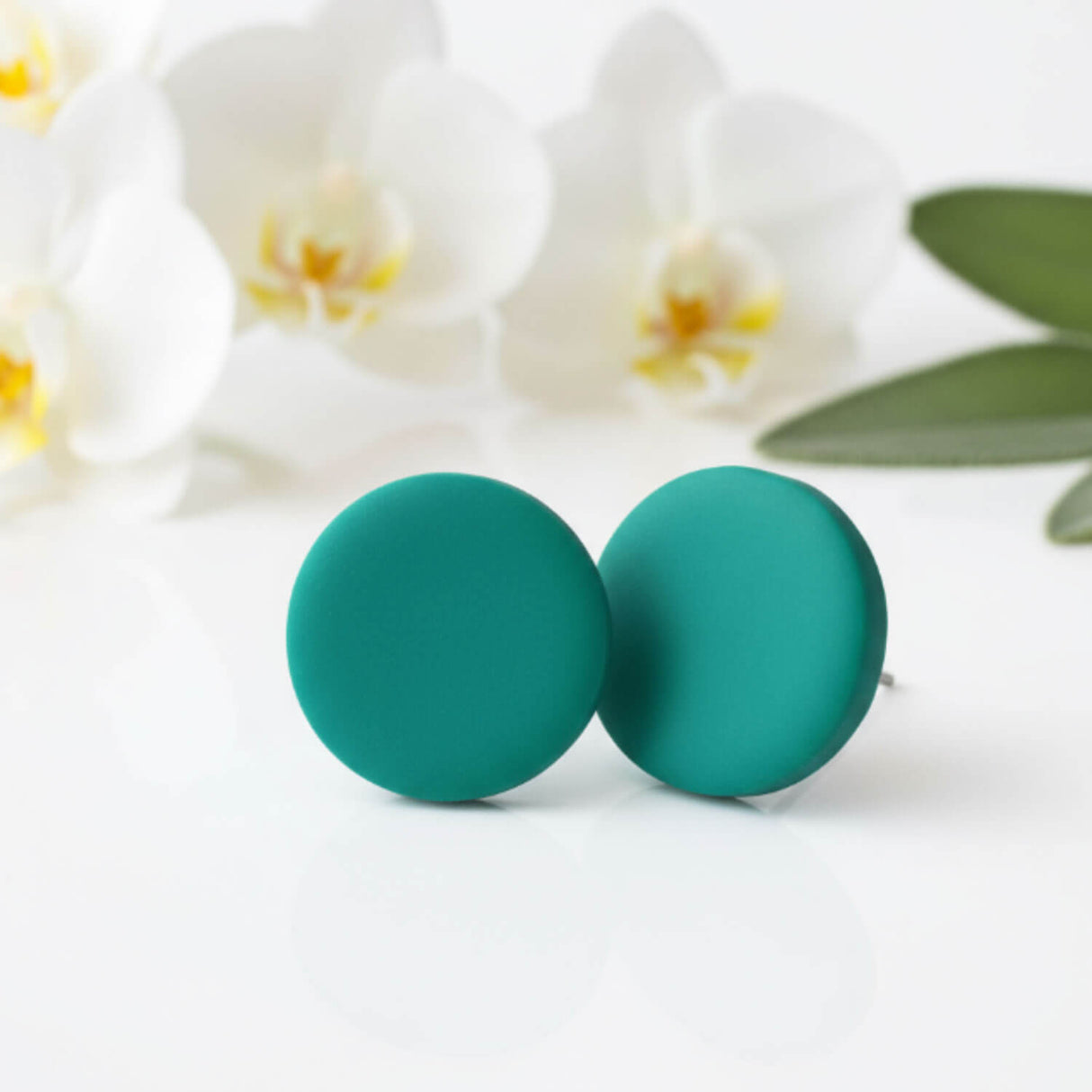 green stud earrings, lifestyle image, handmade clay jewellery at lottie of london