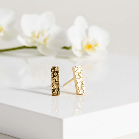 Gold bar stud earrings lifestyle image