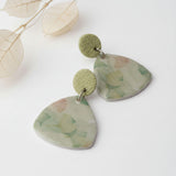 Green statement drop earrings, lifestyle image, handmade jewellery at lottie of london
