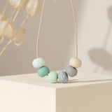 Long Bead Necklace in Green - styled image - Lottie Of London Jewellery