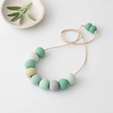 Long Bead Necklace in Green - flat lay image - Lottie Of London Jewellery