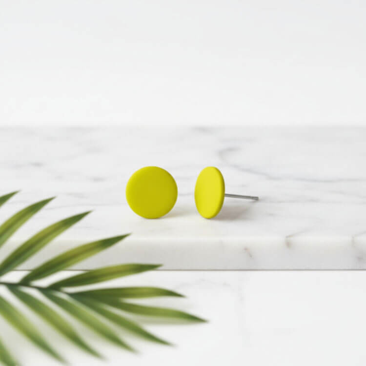 lemon yellow stud earrings, handmade clay jewellery at lottie of london, lifestyle image 