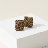 Animal print square stud earrings on plinth, handmade at Lottie Of London