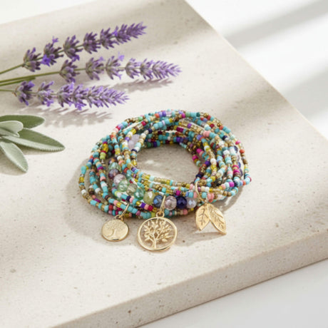 multi coloured stacking bracelet with charms at Lottie Of London