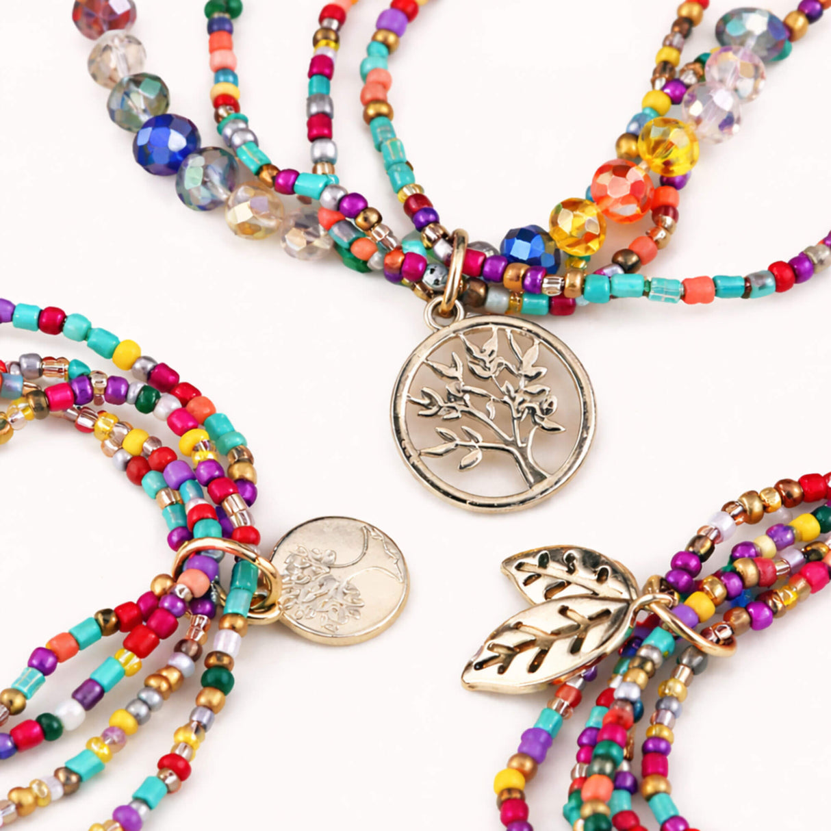 Multi-Colour Beaded Bracelet Stack with Gold Charms – Layered Bracelet Set - close up - Lottie Of London Jewellery