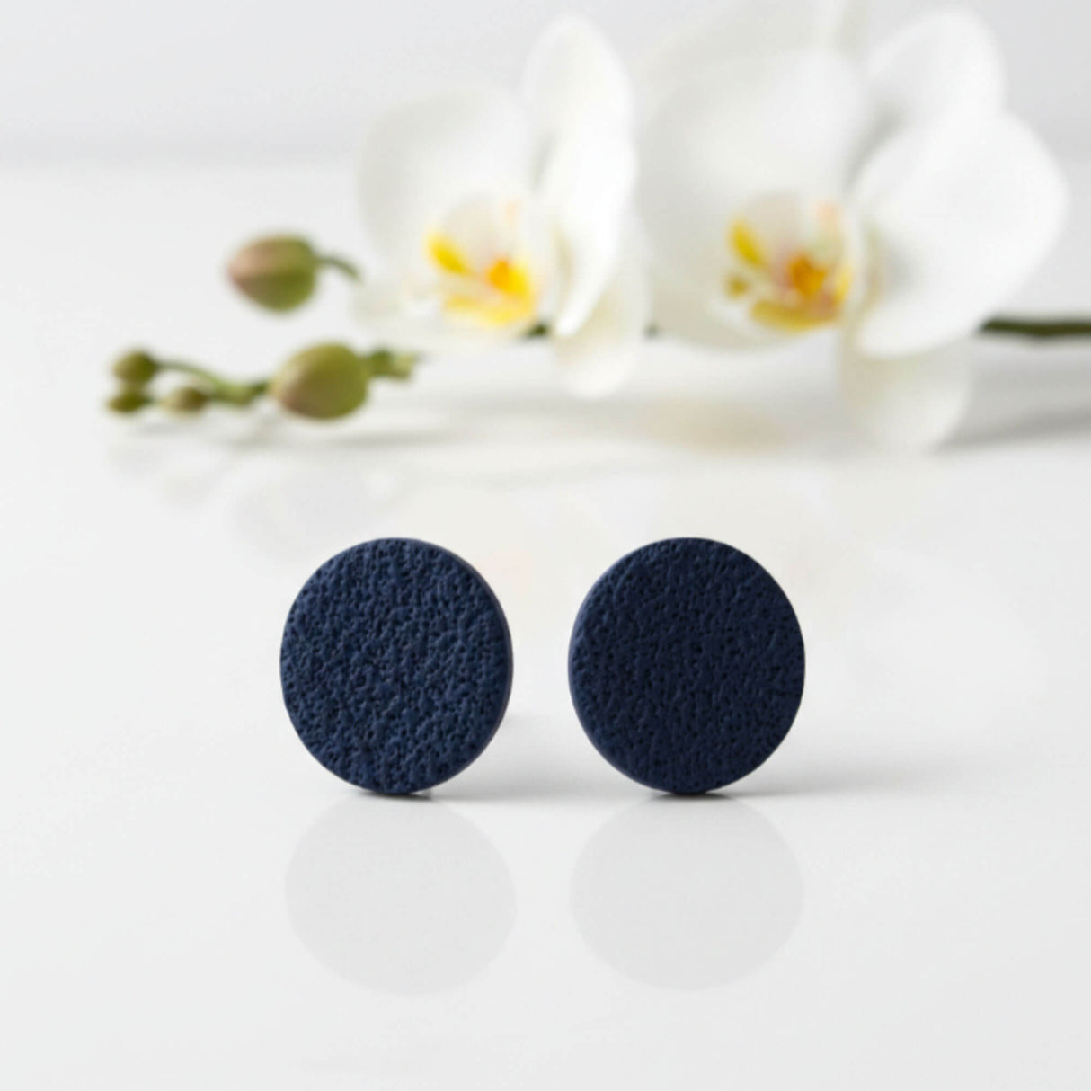 Navy clay stud earrings lifestyle handmade at Lottie Of London