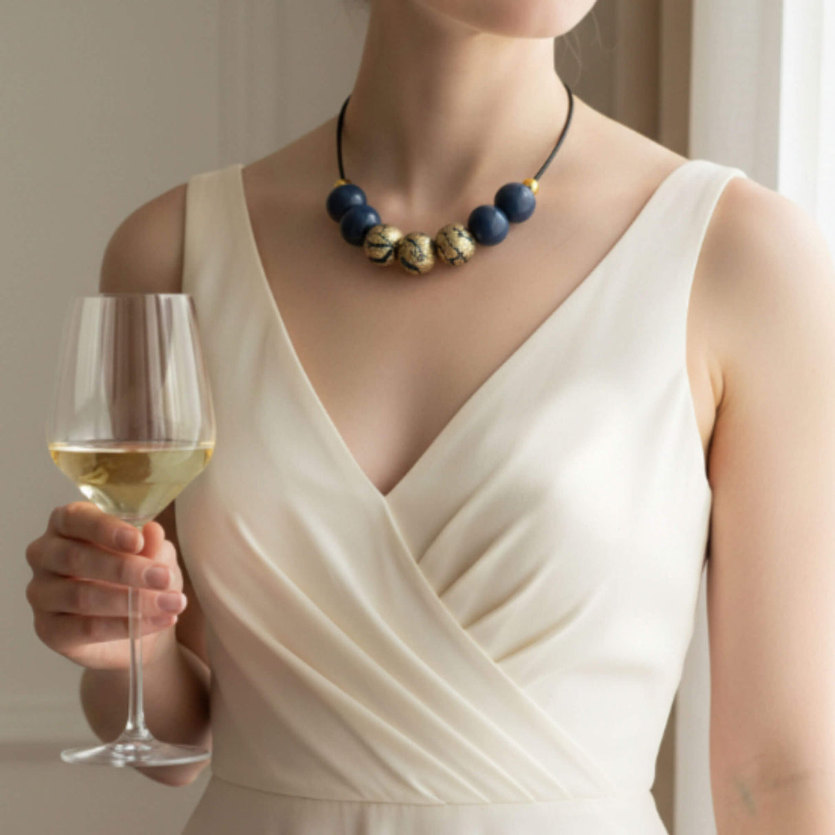 navy gold bead necklace model shot handmade at lottie of london