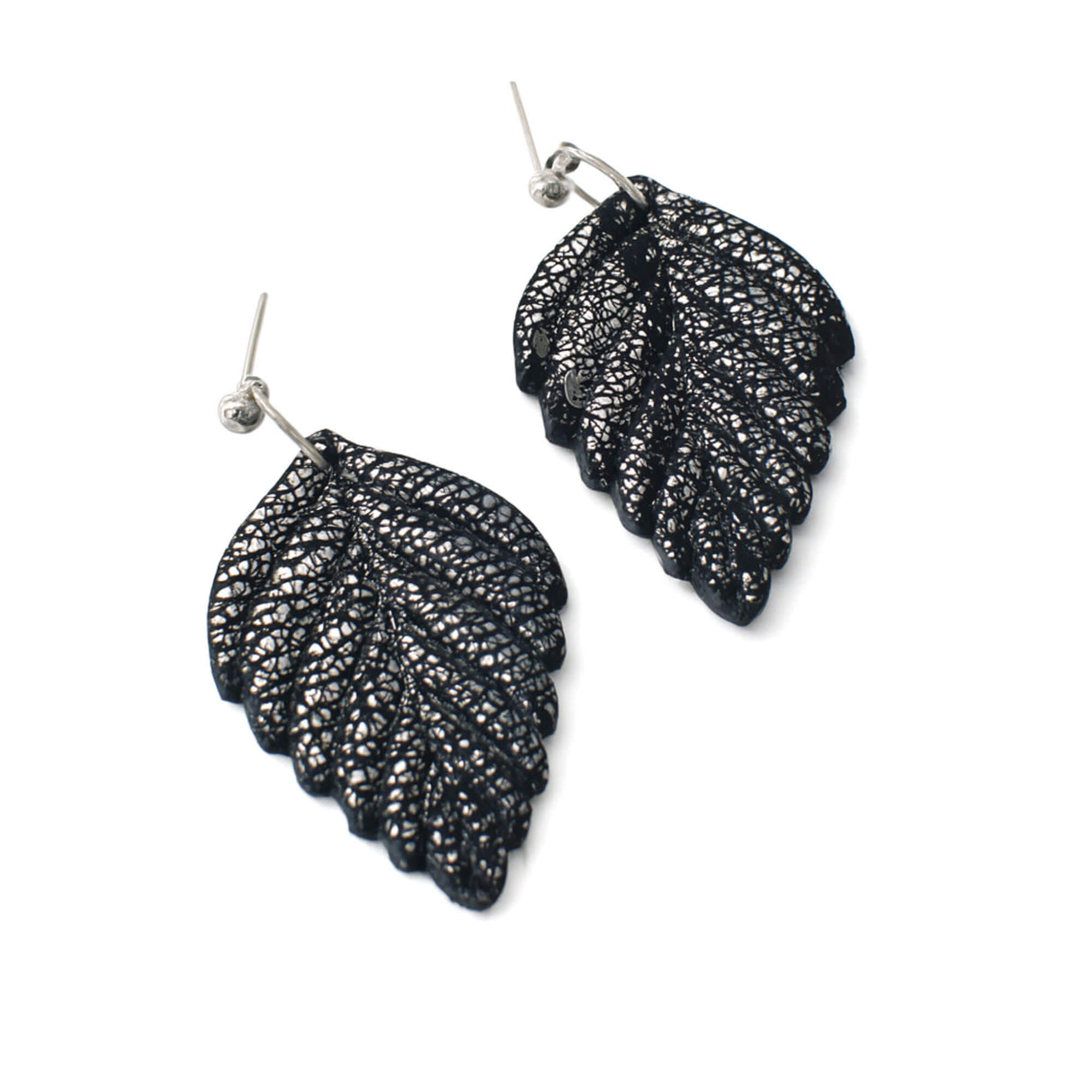 Navy and silver leaf dangle earrings at lottie of london uk