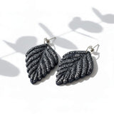 Navy and silver leaf drop earrings at lottie of london 