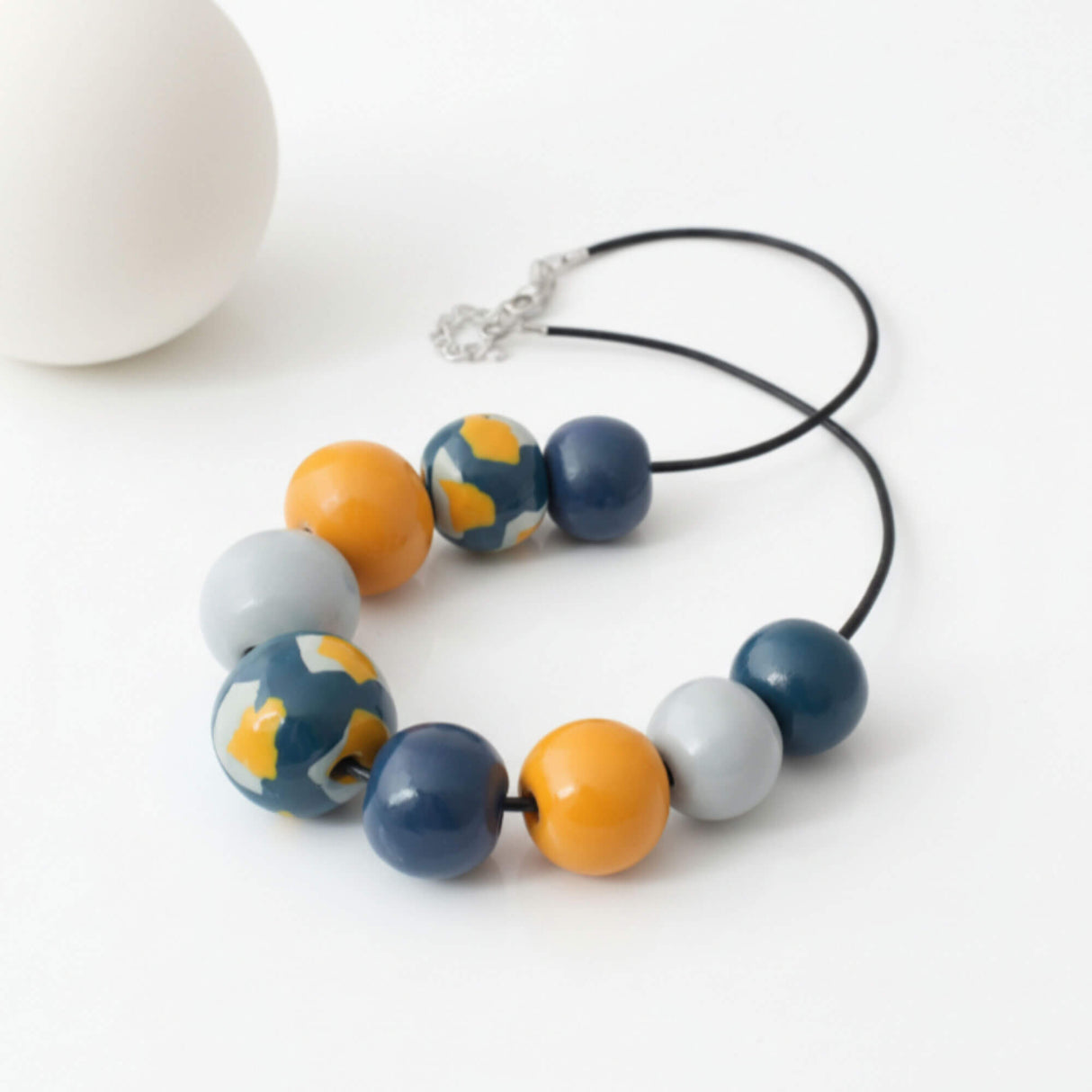 Navy Colour Block Statement Necklace – styled flat lay - Modern Chunky Jewellery - Lottie Of London Jewellery