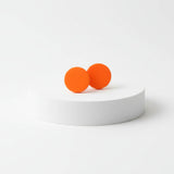 handmade orange clay stud earrings lifestyle at lottie of london