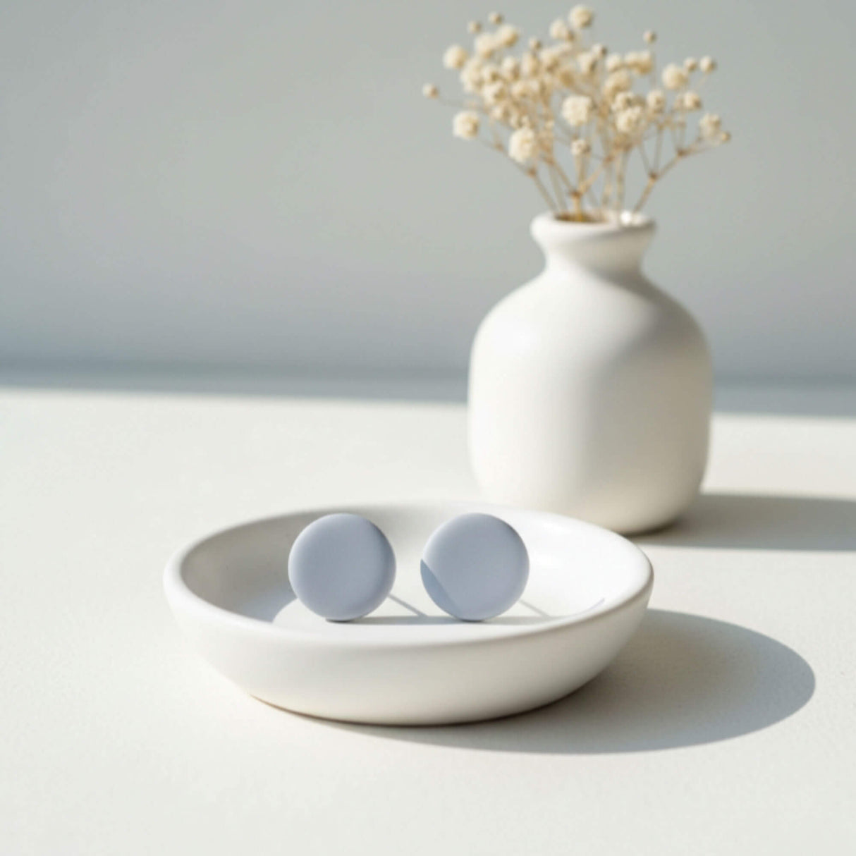 Pale Blue Clay Stud Earrings in a ring dish – Minimalist Handmade Jewellery - Lottie Of London Jewellery