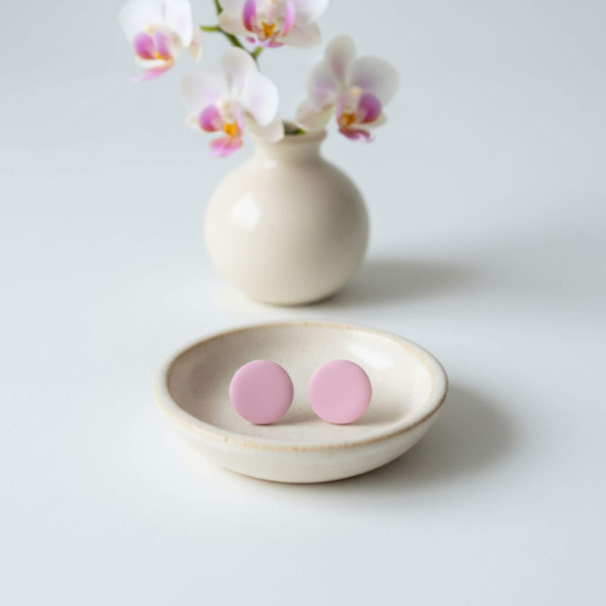 pink clay stud earrings, handmade jewellery at Lottie of London, lifestyle image