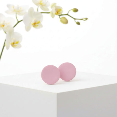 pink stud earrings, handmade clay jewellery at Lottie of London, lifestyle image